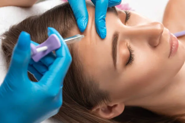 A woman in a clinic getting botox